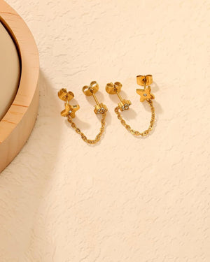 Boucles d'Oreilles Chaîne Étoile & Fleur Brillante - BEQUEEN PARIS